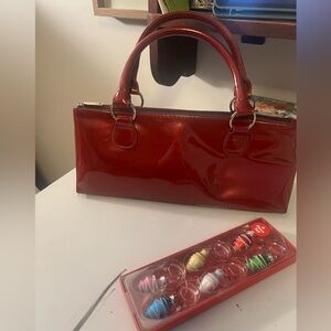 Primeware insulated wine bottle purse.  Wine glass charms included